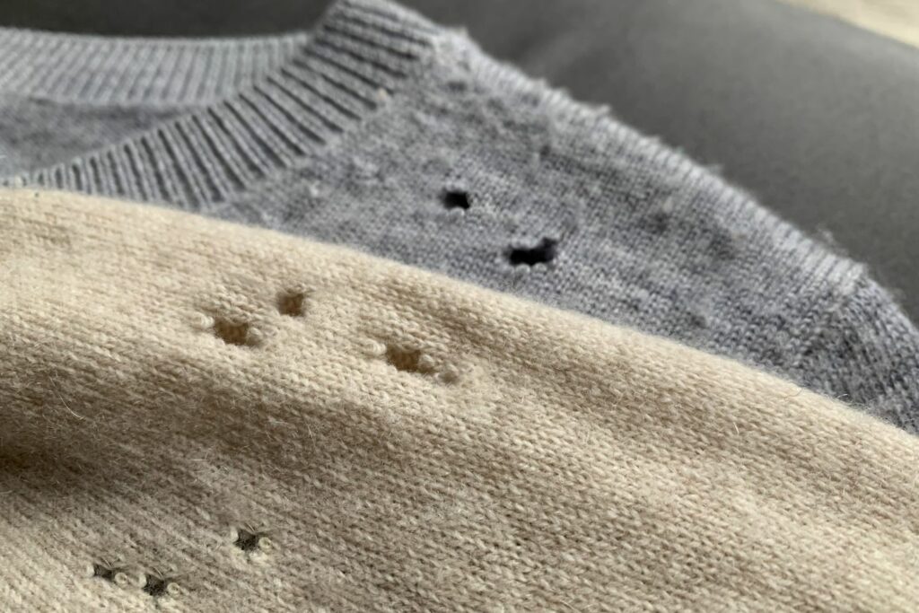 Pullover mit Löchern